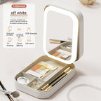 Makeup set with a light-up mirror in a white case on a light background