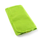 Folded green toiletry bag on a white background