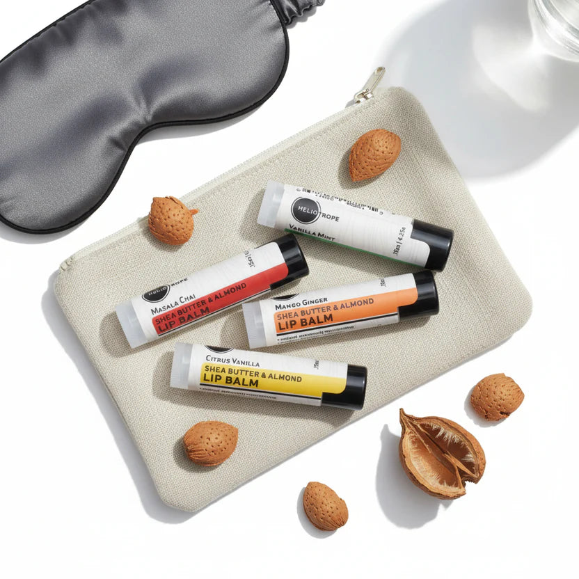Travel size essentials lip balm set in a compact pouch for skincare.