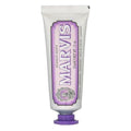 Marvis toothpaste tube with purple and white design on a white background