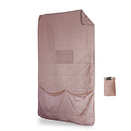 Foldable quilt with a small pouch on a white background