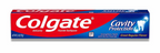 A travel-sized Colgate cavity protection toothpaste tube on a white background