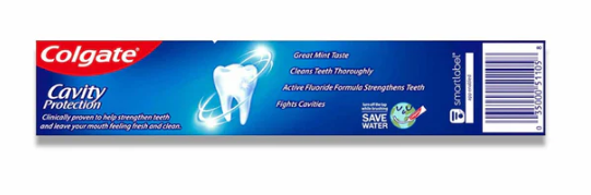 The back of a travel-sized Colgate cavity protection toothpaste tube on a white background