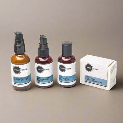Heliotrope travel-size face care sampler with cleanser, toner, moisturizer, and oatmeal soap in vinyl travel bag