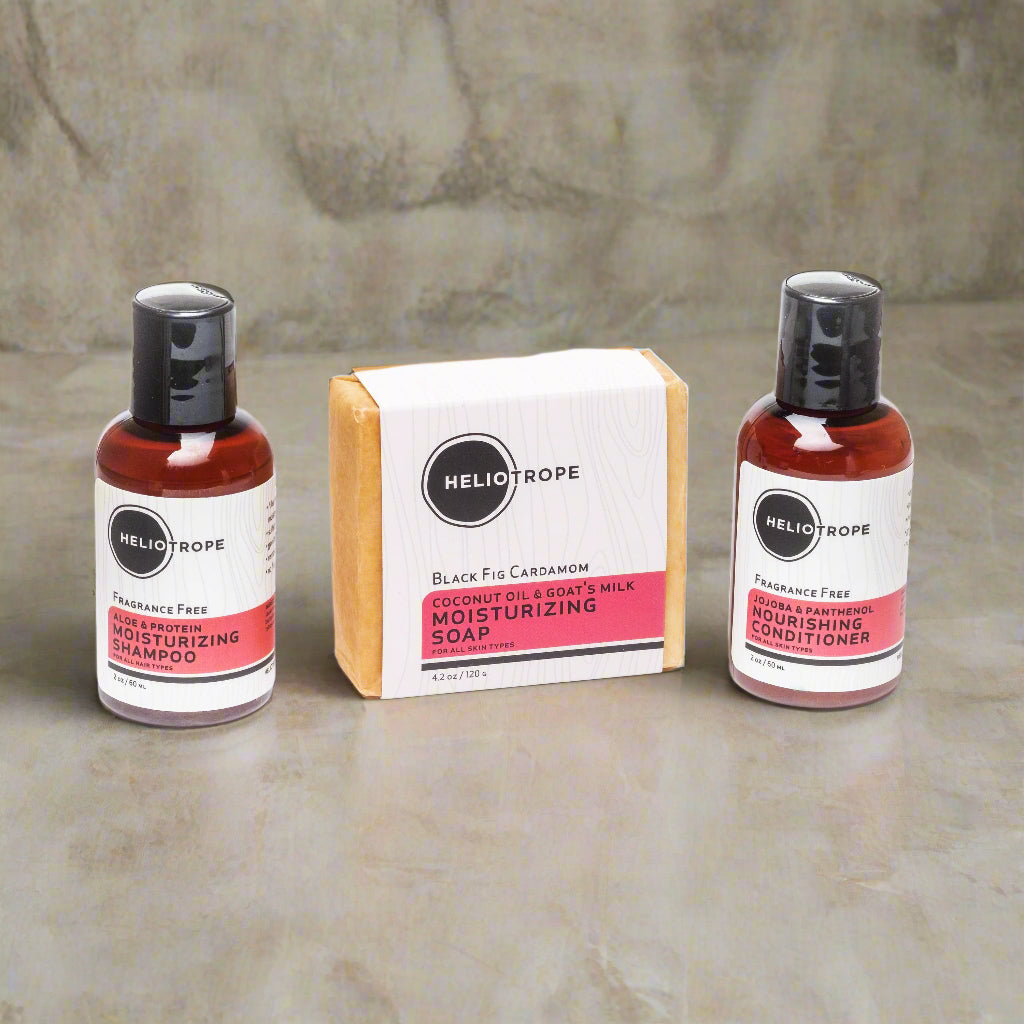 Heliotrope travel-size hair care sampler with shampoo, conditioner, and bar soap in vinyl travel bag