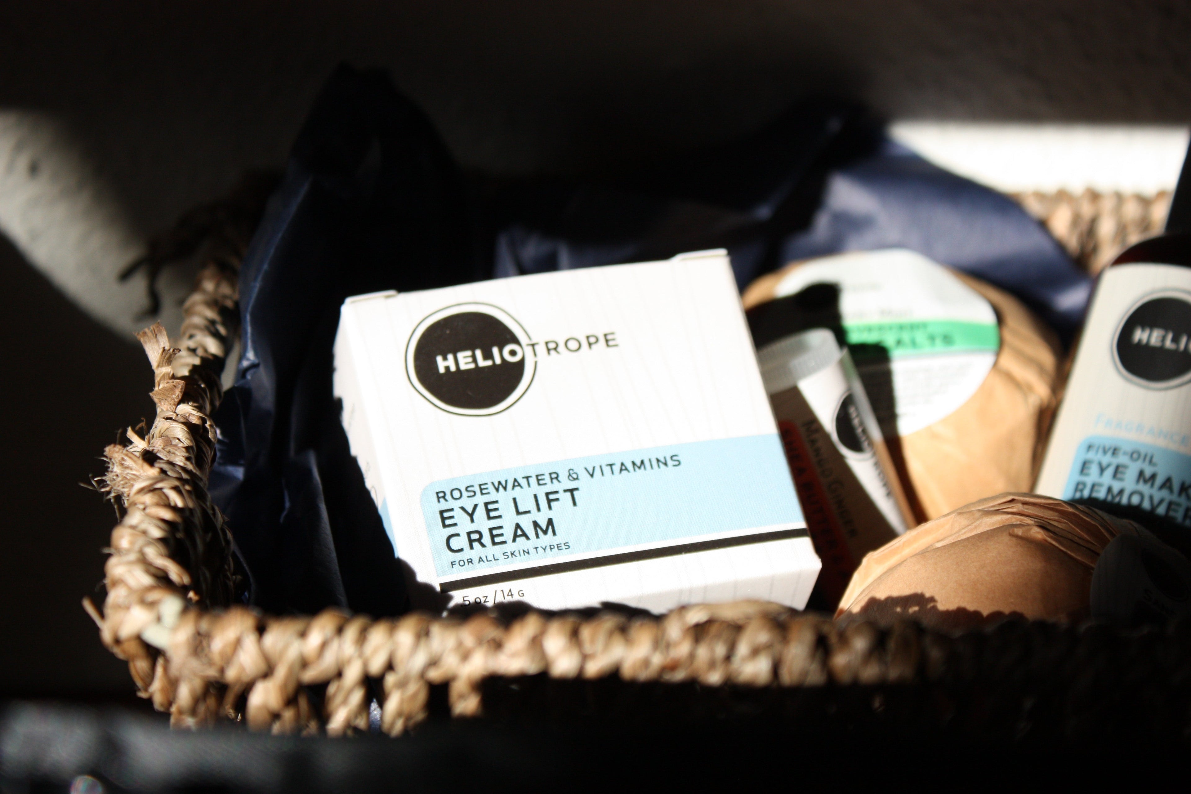 Rosewater & Vitamins Eye Lift Cream in a natural basket