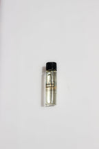 Bottle of Jasmine Essence on a white background.
