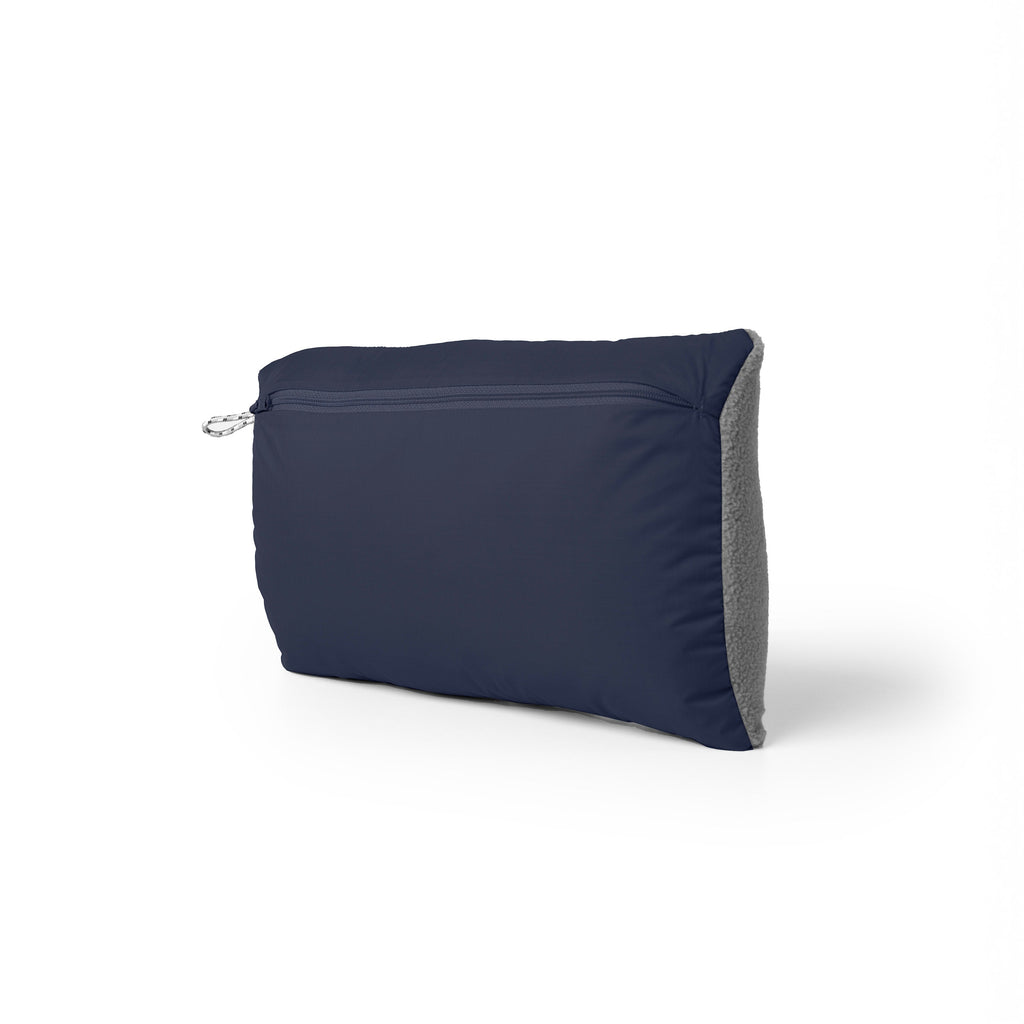 Navy blue pillow with gray accent on a white background