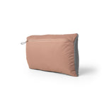 quartz travel pillow with gray zipper on a white background