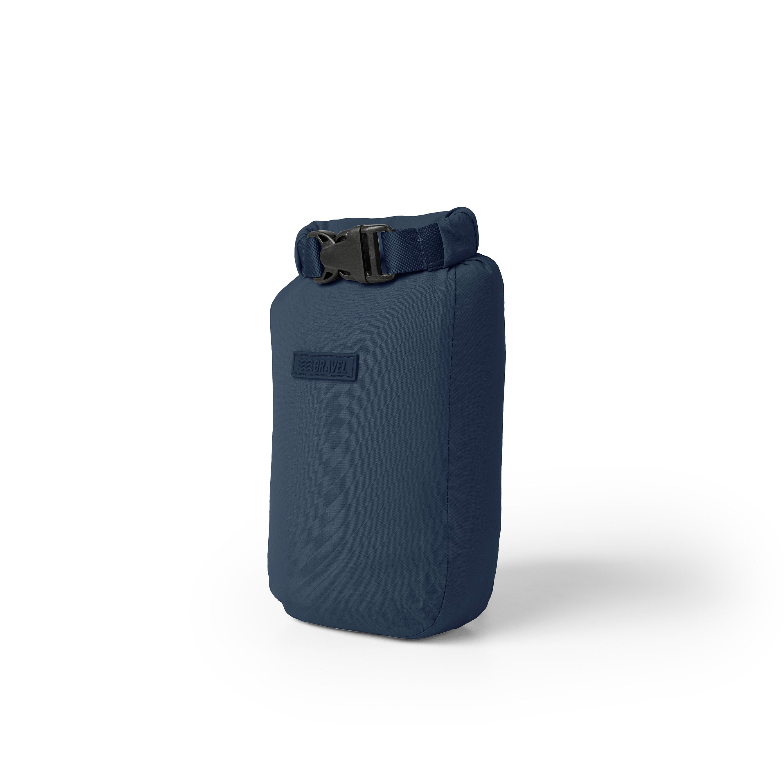 Navy blue dry bag with a black buckle on a white background