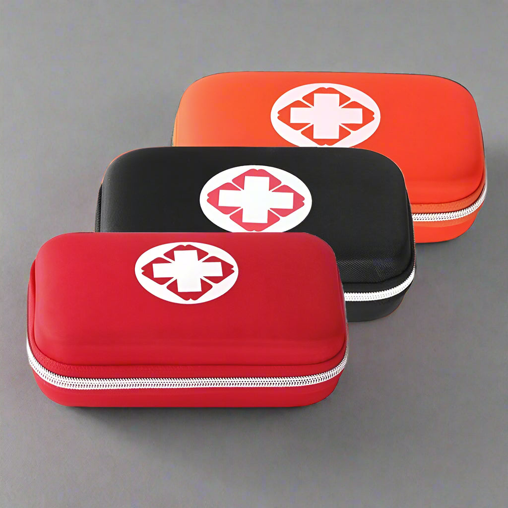 Compact tactical first aid bag in black, blue, red, or orange with zipper and mesh compartments for emergency supplies