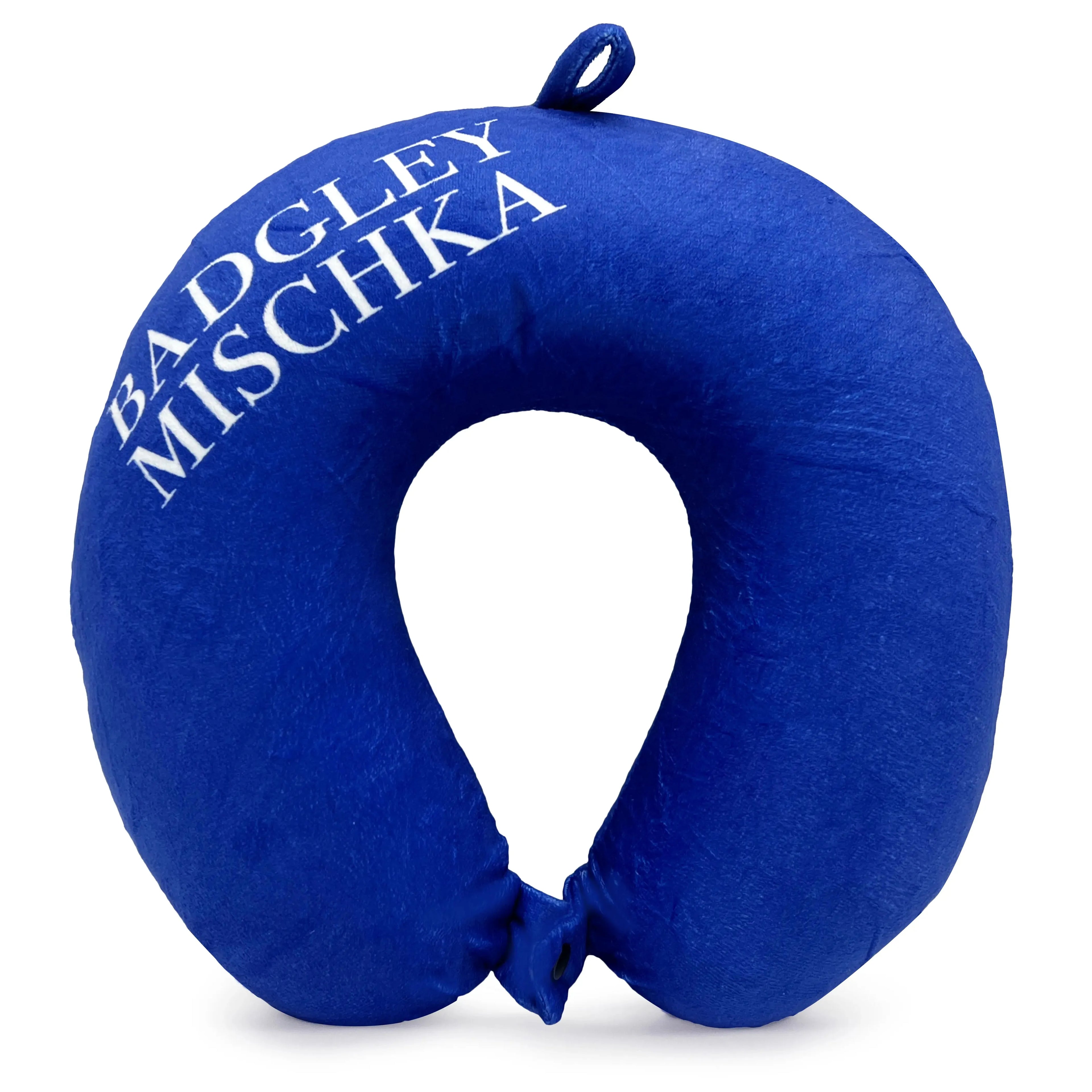 Cobalt blue neck pillow with 'Badgley Mischka' branding on a white background