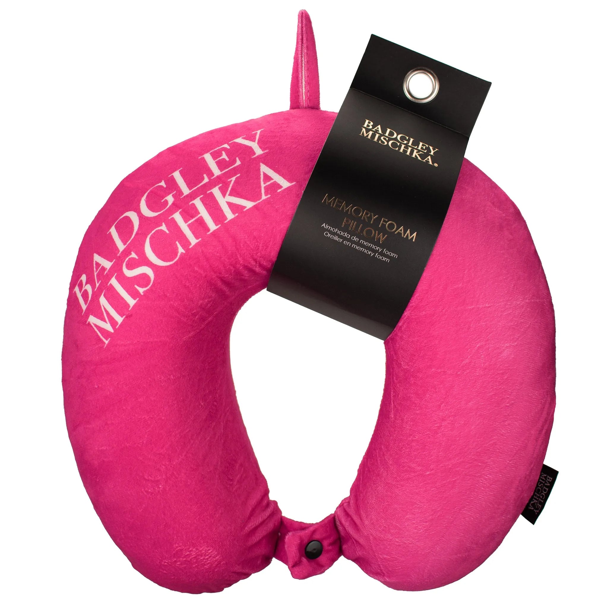 Magenta neck pillow with 'Badgley Mischka' branding on a white background