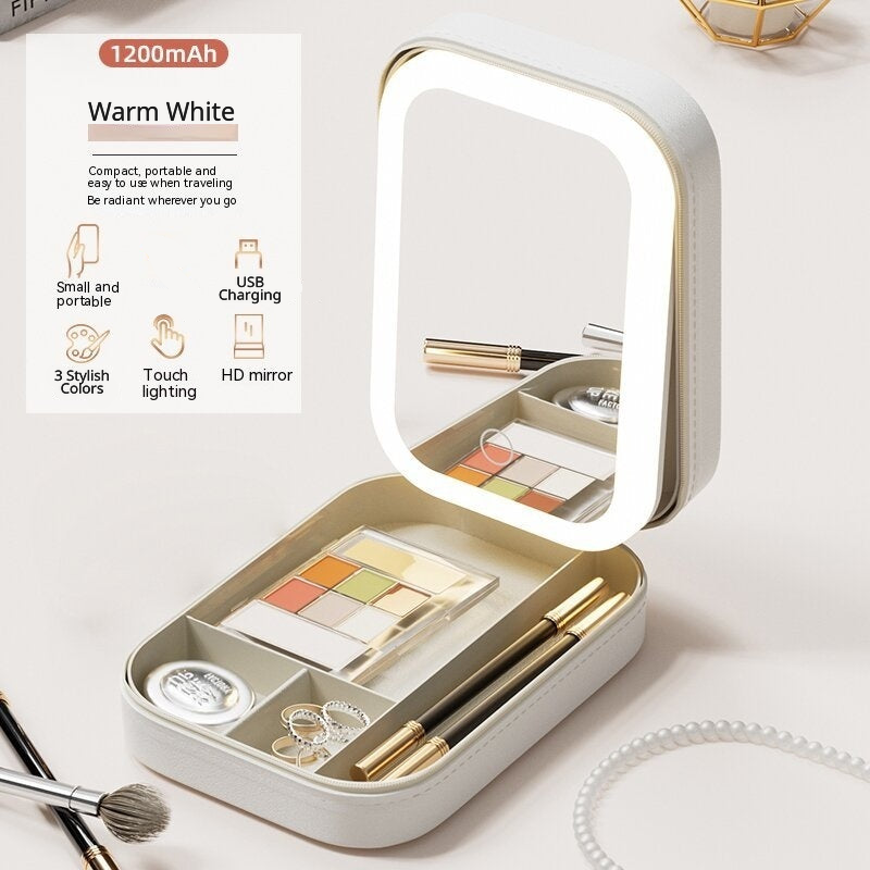 Warm White makeup case with illuminated mirror on a white background. Text shows features: small and portable, USB charging, 3 stylish colors, touch-lighting, and HD mirror.