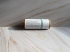 Aluminum-Free Deodorant by J&L Naturals – Plant-Powered Odor Control (3 oz) on a wooden surface, perfect for travel size essentials.