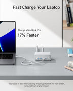 Laptop charging with a fast charging device on a desk, with text indicating faster charging speed.