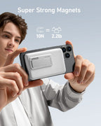 Person holding a phone with a magnetic stand, featuring Anker branding, on a light gray background.