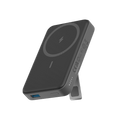 Black wireless charging pad with stand on a white background