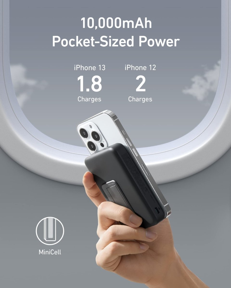 Hand holding a pocket-sized power bank with charging capabilities for iPhone 13 and iPhone 12.