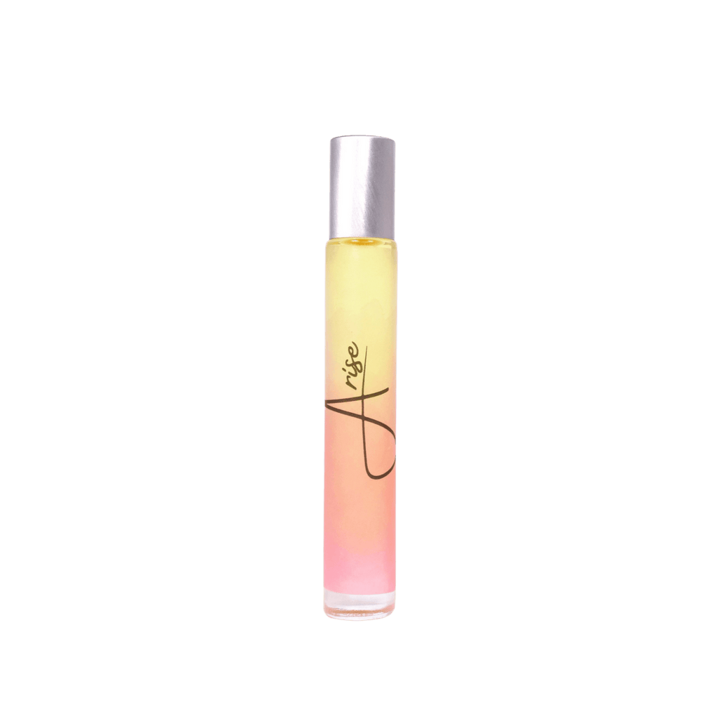 Roll-on perfume bottle with gradient design on a solid background