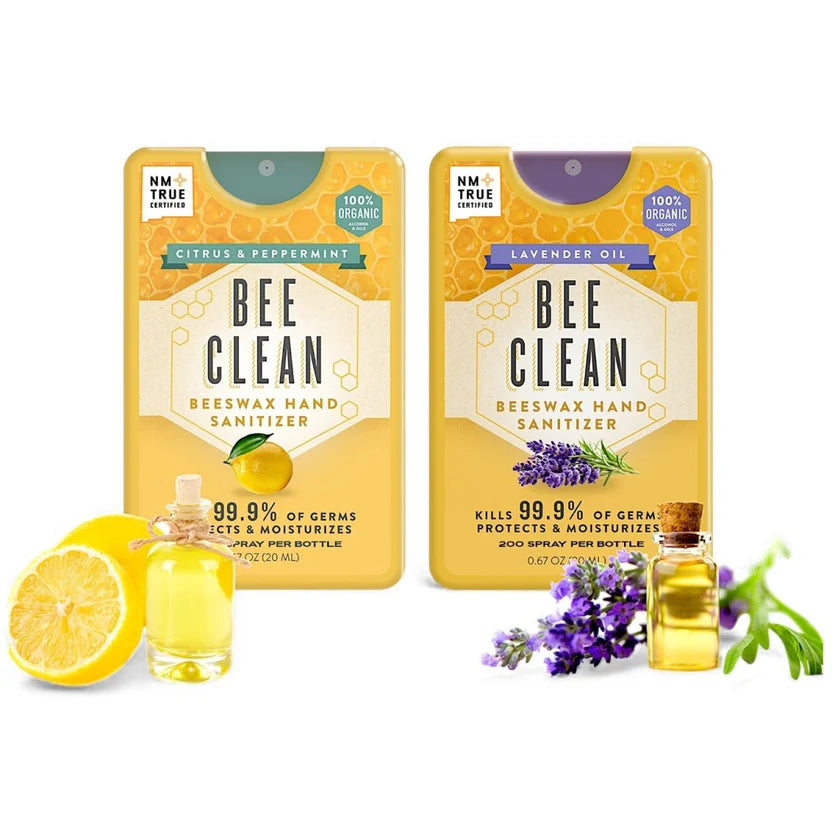 Two packages of Bee Clean beeswax hand sanitizer with lemon and lavender elements on a white background.