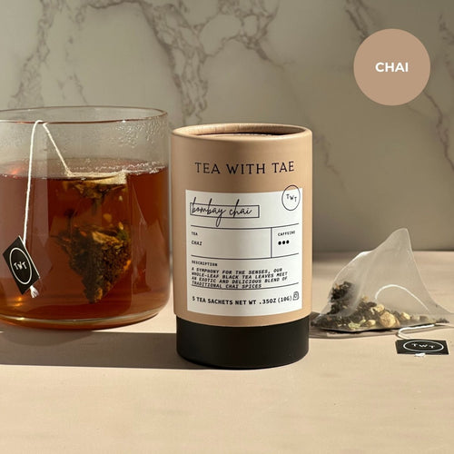 Bombay Chai Mini Tea Tube – Spiced Assam Black Tea (5 Sachets) in a travel size essentials setup.