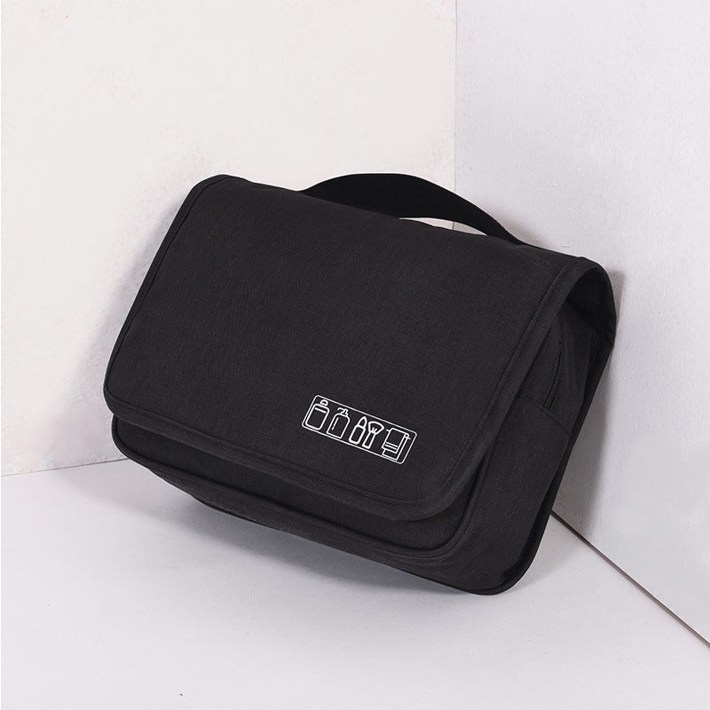 Black toiletry bag with a logo on a white background
