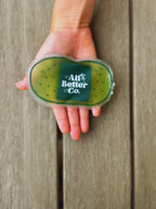 Chill Pack in hand, a travel size essential for soothing injuries.