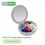Compact Travel Pill Organizer with Mirror for travel size essentials.