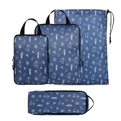 Set of three blue packing cubes with white patterns on a white background