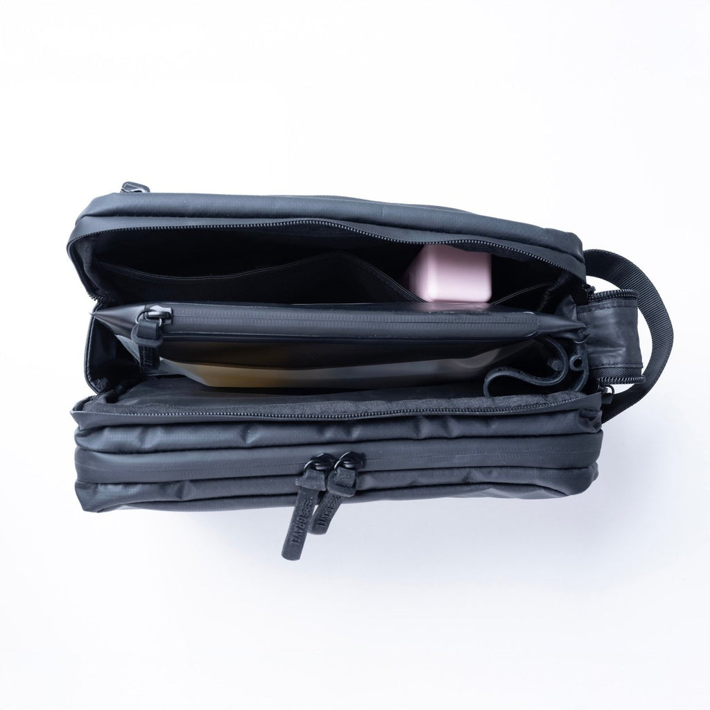 Explorer MAX™ Toiletry Bag - Packing the Most with pockets for travel size essentials.