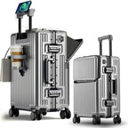 Two silver suitcases with a smartphone on top, one open showing contents.