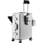 Silver suitcase with attached accessories on a white background