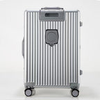 Silver suitcase with wheels on a white background
