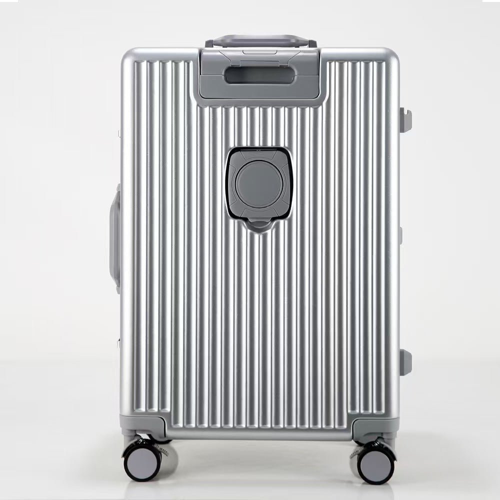 Silver suitcase with wheels on a white background