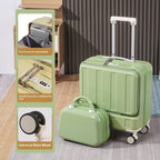 Green suitcase with accessories and packaging on a wooden floor.