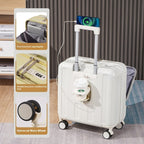 White suitcase with charging cable and packaging on a wooden floor.