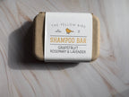 Grapefruit Rosemary Lavender Shampoo Bar in eco-friendly packaging