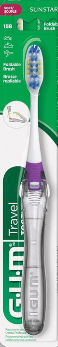 GUM travel folding toothbrush with a purple accent in its retail packaging