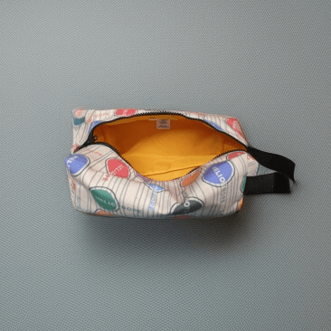 Heliotrope Logo Pattern Dopp Kit for travel size essentials