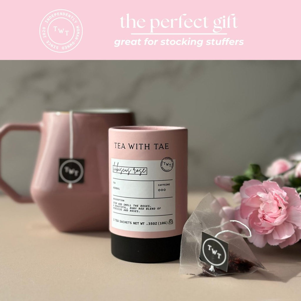 Hibiscus Rose Mini Tea Tube – Floral & Fruity Herbal Blend (5 Sachets) with pink mug and flowers