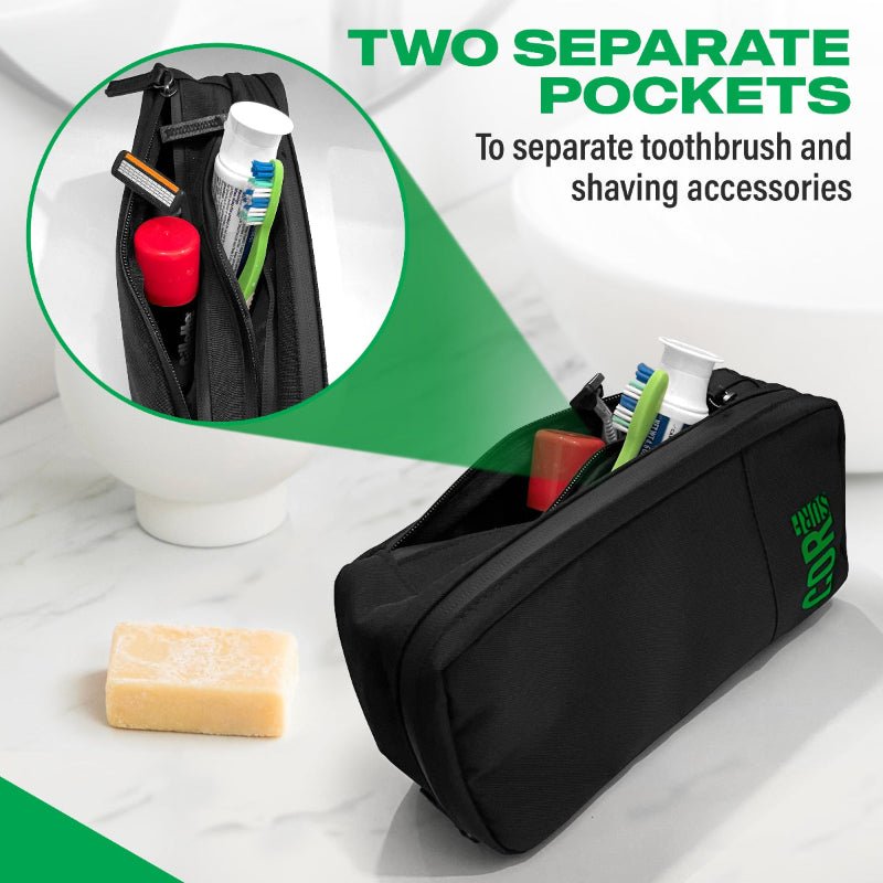 Black toiletry bag with two separate pockets for toothbrush and shaving accessories on a white background.