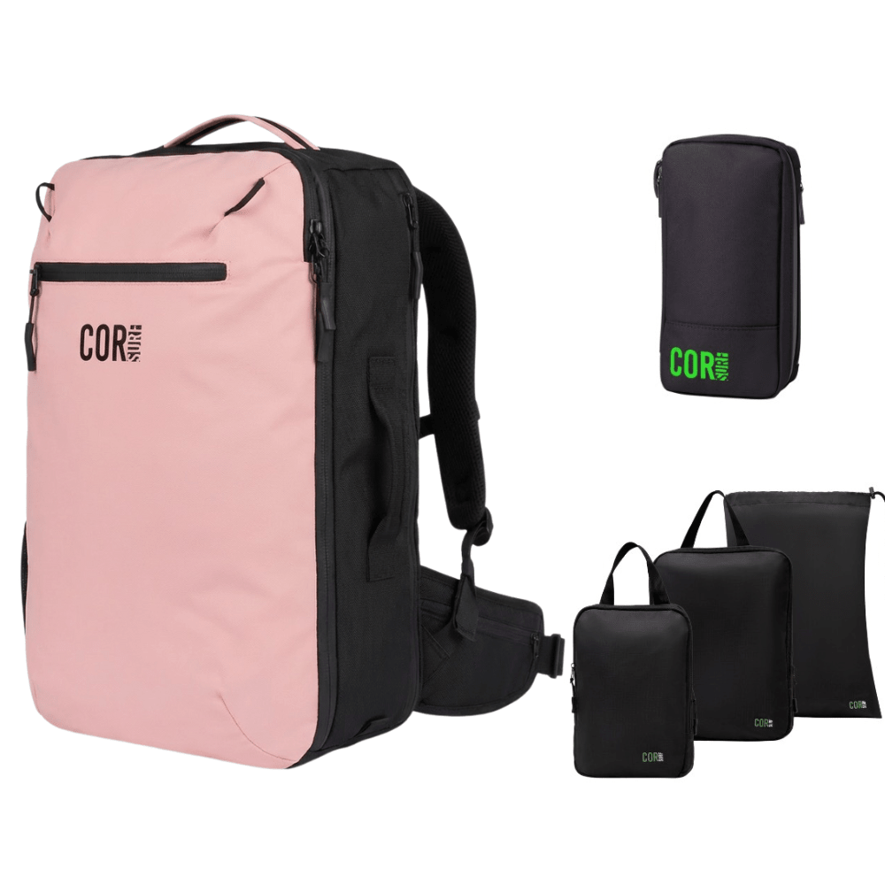 Pink and black backpack with smaller black bags on a white background