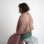 Layover™ XL Travel Blanket - Quartz in a cozy setting.