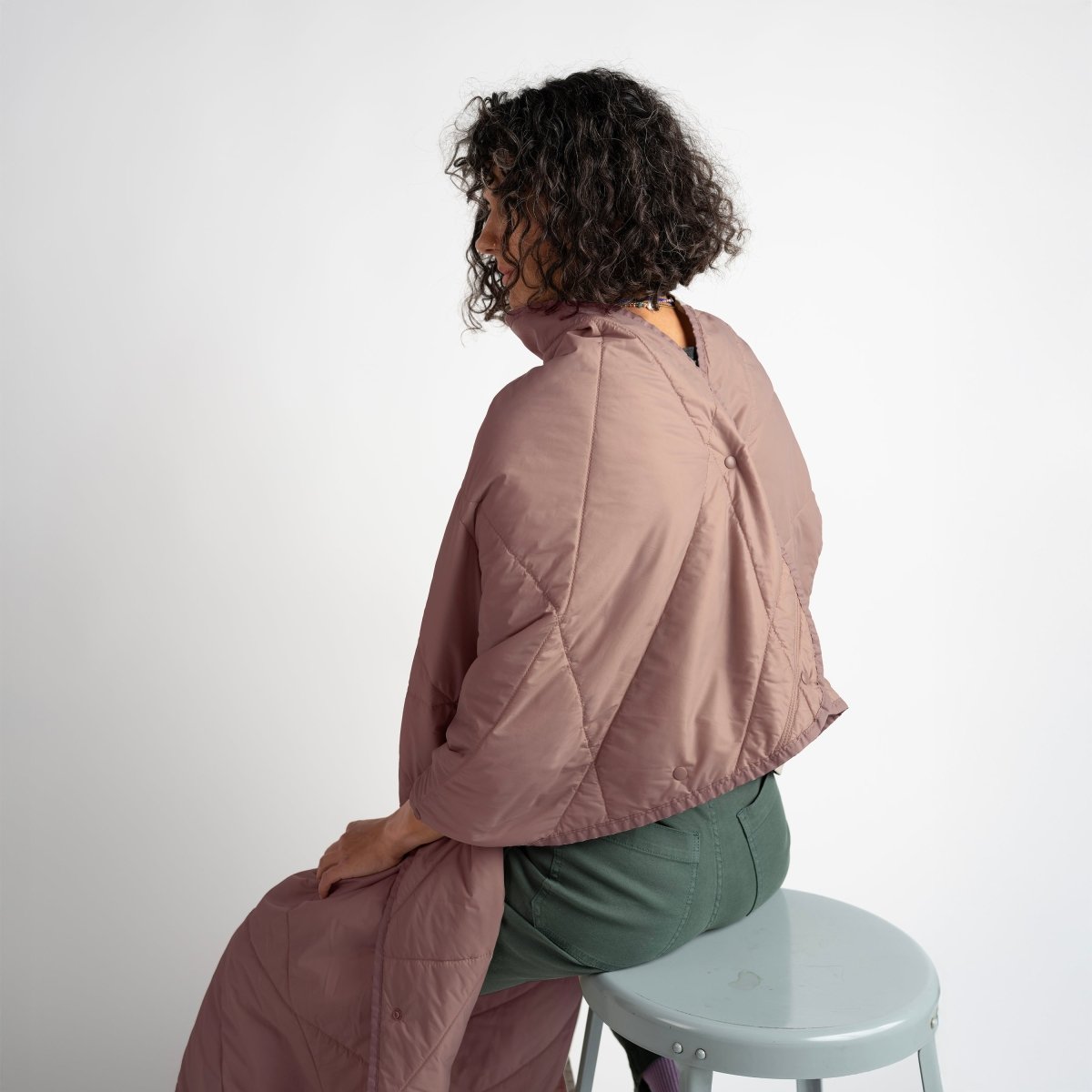 Layover™ XL Travel Blanket - Quartz in a cozy setting.