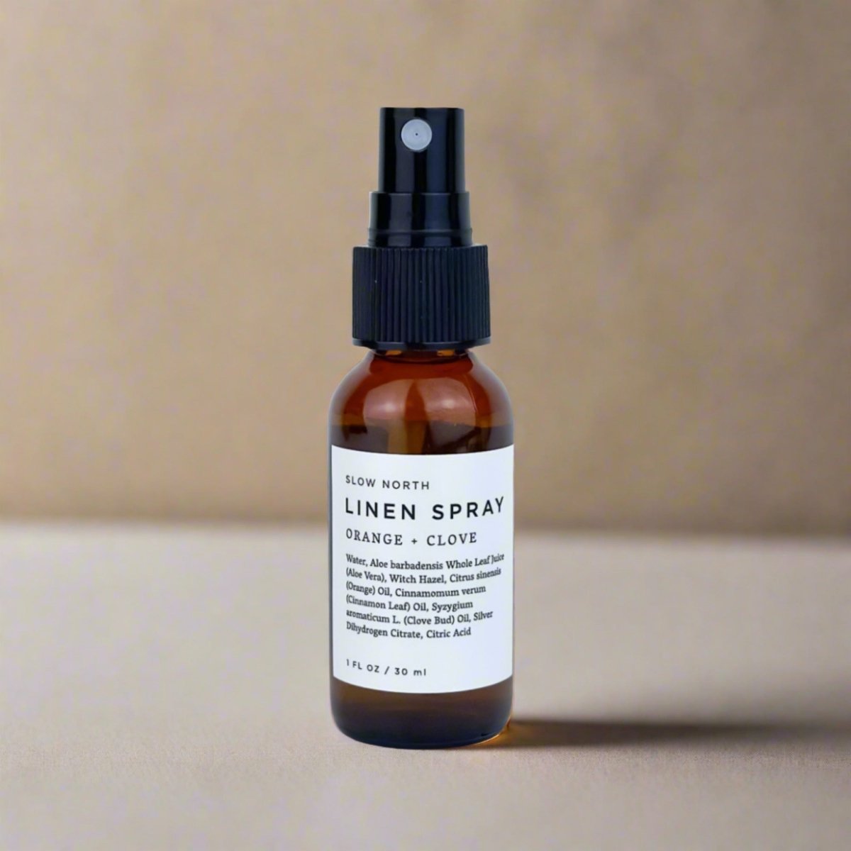 Mini Linen Spray - Orange & Clove in travel size bottle