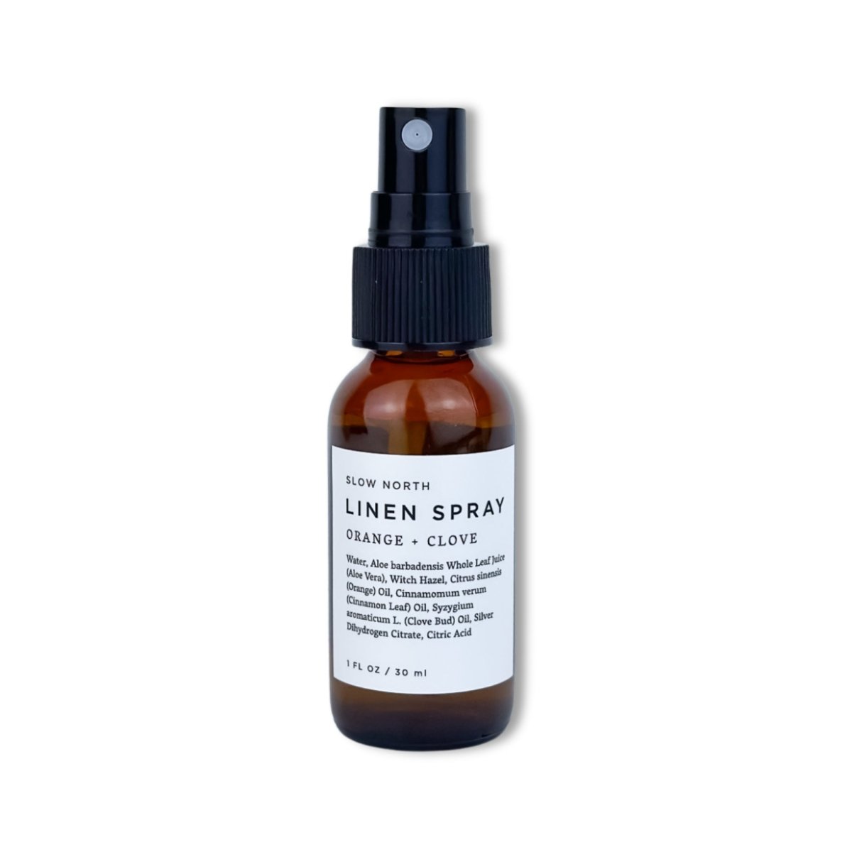 Mini Linen Spray - Orange & Clove in a travel size bottle