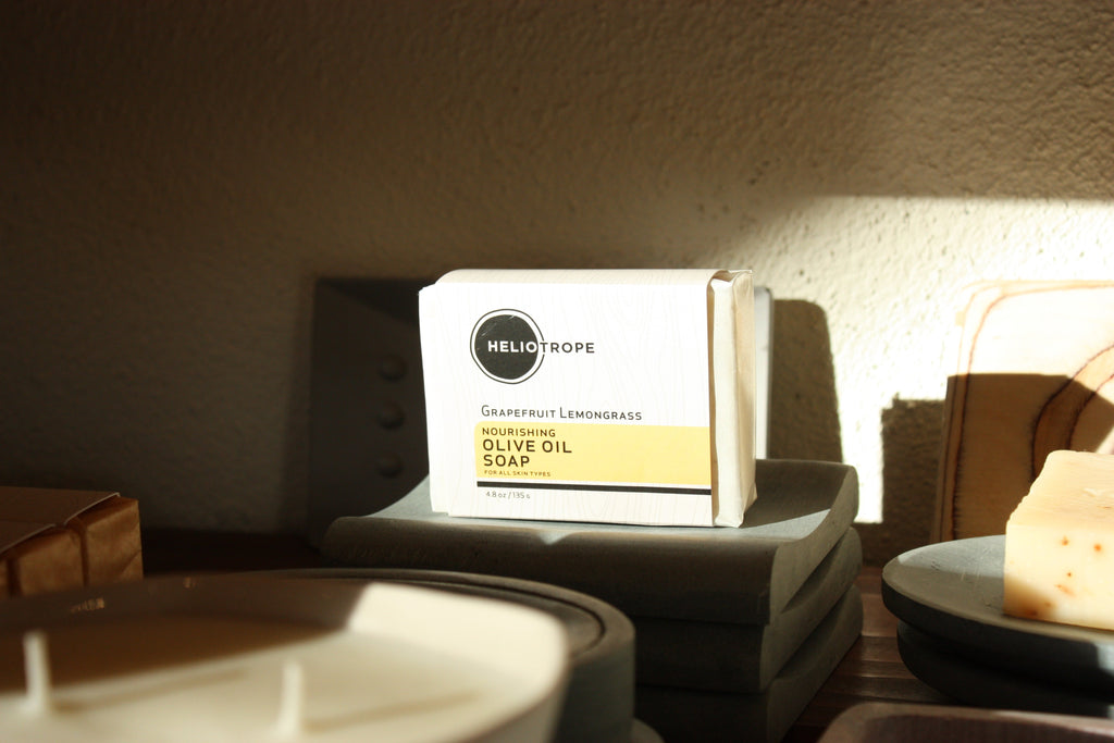 Heliotrope Nourishing Olive Oil Soap in a travel size essentials kit