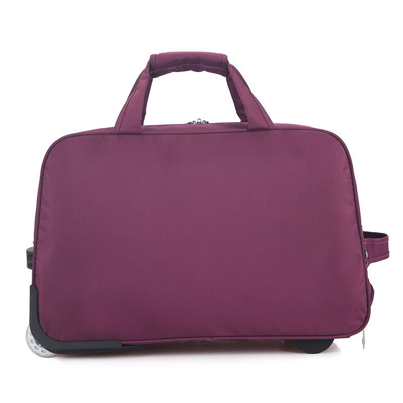 Purple suitcase with wheels on a white background