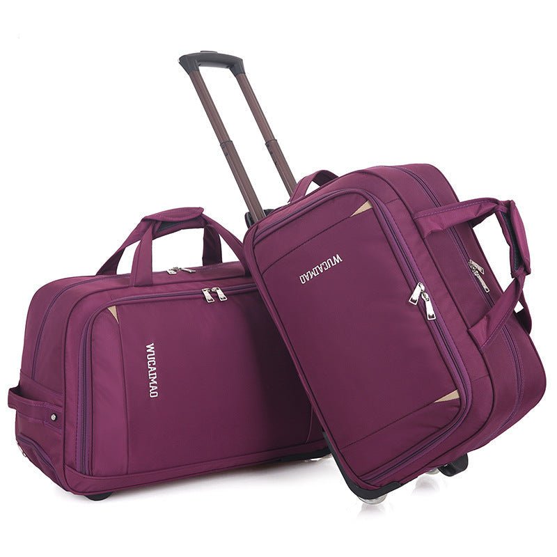 Two purple suitcases with wheels on a white background